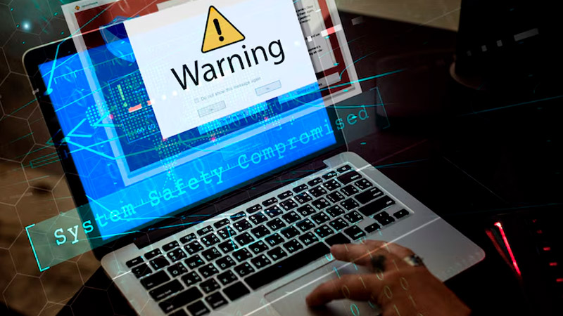 Notebook exibindo tela de erro, indicando necessidade de formatação, em um ambiente de trabalho no Rio de Janeiro.